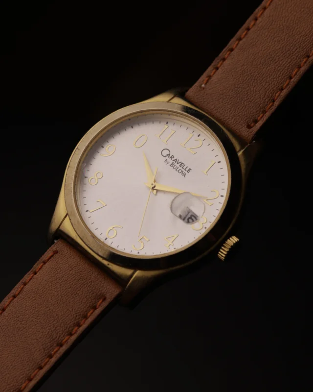 Caravelle by Bulova Vintage Watch | Quartz | Gold-Tone Case | Date Magnifier | 1990s