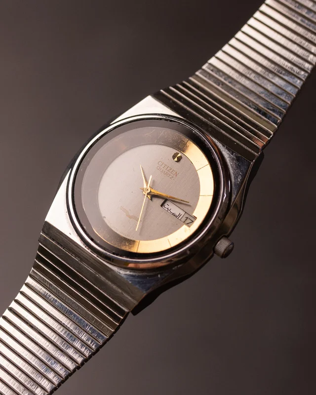 Citizen Quartz Two-Tone (Arabic Day Display)
