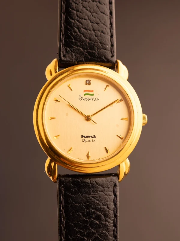 HMT Swarna (Ref. 2080-YGGL52) (33mm; Quartz)