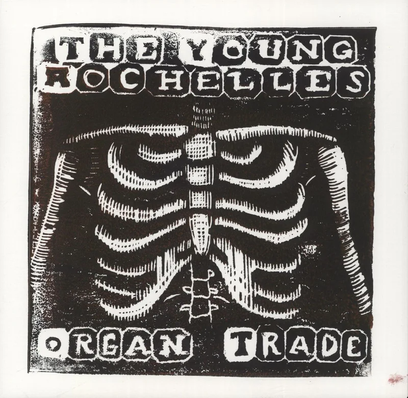 The Young Rochelles Organ Trade - Red w/ White Splatter Vinyl - Numbered US 7" vinyl