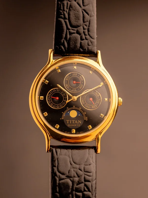 Titan Triple Calender Moonphase (Ref. 257YAA) (36mm; Quartz)